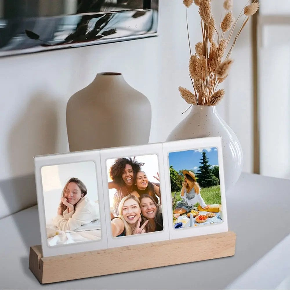 3-in-1 acrylic LED photo frame for instant camera prints – natural wood base, soft daylight desktop styling by Nestoryplace