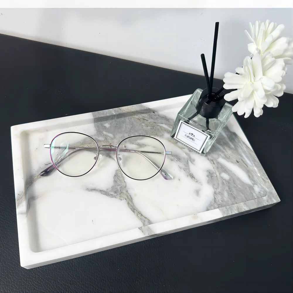 Elegant trinket tray made of Calacatta marble for dresser storage