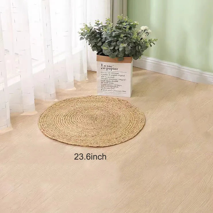 Small 60cm straw rug used as plant mat for decorative display