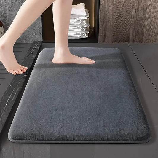 Grey coral velvet bath mat with soft texture, non-slip backing, and cozy foot support—perfect for bathroom floors