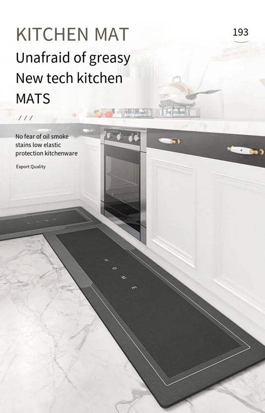 Long black diatomite kitchen floor mat set in a modern white kitchen, oil-resistant and washable design with “HOME” lettering for cozy interiors