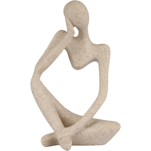 Front view of abstract sandstone thinker sculpture for shelf or desk